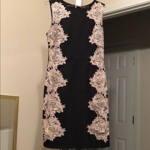 Black dress with light cream roses